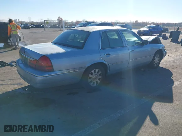 ✅ 2003 Mercury Grand Marquis LS Premium • VIN: 2MEFM75W13X701638 • Lot: 43634013. Wystawiony na IAAI z przebiegiem 221 625 mil. Bezpłatny archiwum sprzedaży aukcyjnych z USA i szczegółowy raport historii pojazdu na DreamBid. Zdjęcie 4.