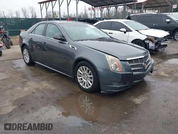 ✅ 2011 Cadillac CTS Luxury • VIN: 1G6DG5EY7B0163601 • Lot: 41536256. Listed on IAAI with 106,523 mi. Free auction sales archive from the USA and detailed vehicle history report at DreamBid. Image 1.