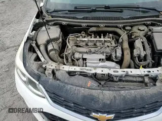 ✅ 2018 Chevrolet Cruze LS • VIN: 1G1BC5SM0J7138748 • Lot: 67543995. Listed on Copart with 114,001 mi. Free auction sales archive from the USA and detailed vehicle history report at DreamBid. Image 15.