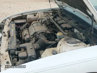 ✅ 1994 Buick Park Avenue Ultra • VIN: 1G4CU5212R1632585 • Lot: 42950180. Listed on IAAI with 115,240 mi. Free auction sales archive from the USA and detailed vehicle history report at DreamBid. Image 12.