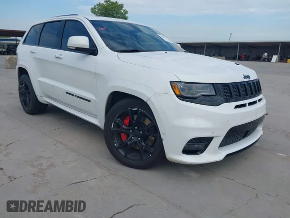✅ 2019 Jeep Grand Cherokee SRT • VIN: 1C4RJFDJ6KC564151 • Lot: 42882158. Wystawiony na IAAI z przebiegiem 124 847 mil. Bezpłatny archiwum sprzedaży aukcyjnych z USA i szczegółowy raport historii pojazdu na DreamBid. Zdjęcie 1.