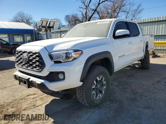✅ 2020 Toyota Tacoma TRD Off Road • VIN: 5TFCZ5AN8LX229547 • Лот: 73832075. Опубликован ранее на Copart с пробегом 69 756 миль. Бесплатный доступ к архиву аукционных продаж из США и подробный отчёт об истории автомобиля на DreamBid. Изображение 1.