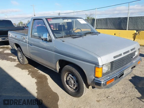 ✅ 1987 Nissan Hardbody E • VIN: JN6ND11S5HW001893 • Лот: 43162014. Опубликован ранее на IAAI с пробегом 204 833 миль. Бесплатный доступ к архиву аукционных продаж из США и подробный отчёт об истории автомобиля на DreamBid. Изображение 1.