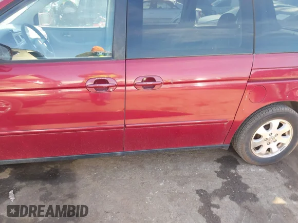 ✅ 2002 Honda Odyssey EX • VIN: 2HKRL18672H546314 • Lot: 44606898. Wystawiony na IAAI z przebiegiem 242 940 mil. Bezpłatny archiwum sprzedaży aukcyjnych z USA i szczegółowy raport historii pojazdu na DreamBid. Zdjęcie 6.