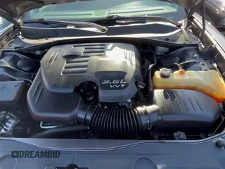 ✅ 2014 Dodge Charger SXT • VIN: 2C3CDXHG4EH161082 • Lot: 92727135. Listed on Copart with 173,920 mi. Free auction sales archive from the USA and detailed vehicle history report at DreamBid. Image 11.