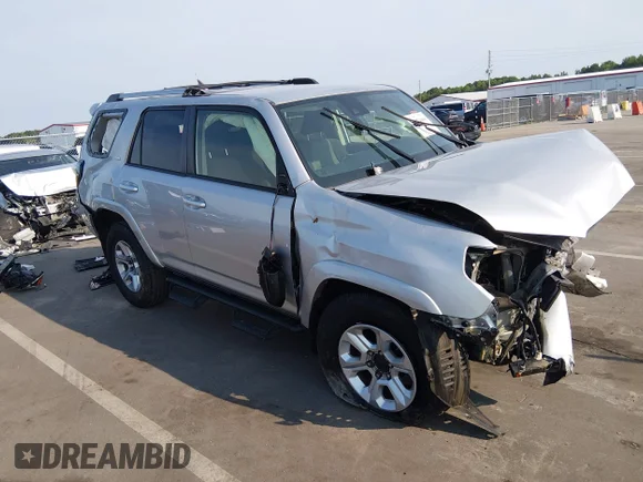 ✅ 2021 Toyota 4Runner SR5 • VIN: JTEMU5JR2M5885001 • Lot: 45471009. Listed on IAAI with 137,063 mi. Free auction sales archive from the USA and detailed vehicle history report at DreamBid. Image 1.