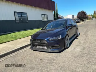 ✅ 2013 Mitsubishi Lancer Evolution GSR • VIN: JA32W8FV1DU024118 • Lot: 90702575. Wystawiony na Copart z przebiegiem 125 841 mil. Bezpłatny archiwum sprzedaży aukcyjnych z USA i szczegółowy raport historii pojazdu na DreamBid. Zdjęcie 11.