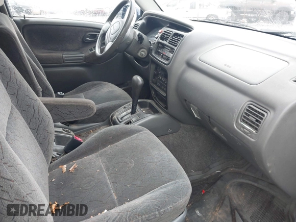 ✅ 2002 Chevrolet Tracker LT • VIN: 2CNBE634126936291 • Lot: 44494599. Wystawiony na IAAI z przebiegiem 242 630 mil. Bezpłatny archiwum sprzedaży aukcyjnych z USA i szczegółowy raport historii pojazdu na DreamBid. Zdjęcie 5.