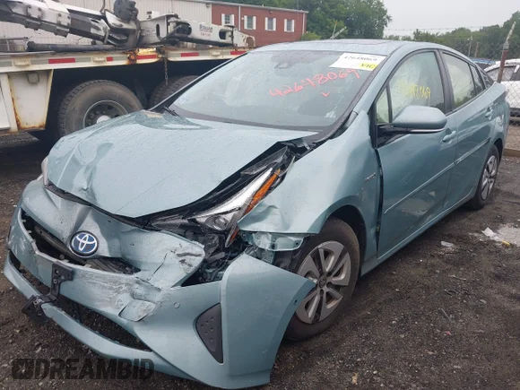 ✅ 2017 Toyota Prius Two • VIN: JTDKARFU5H3045076 • Lot: 42648069. Listed on IAAI with 125,459 mi. Free auction sales archive from the USA and detailed vehicle history report at DreamBid. Image 2.