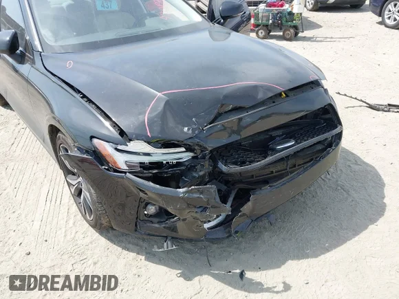 ✅ 2023 Volvo S60 Core Dark Theme • VIN: 7JRL12FV2PG234605 • Lot: 42082020. Listed on IAAI with 33,588 mi. Free auction sales archive from the USA and detailed vehicle history report at DreamBid. Image 6.
