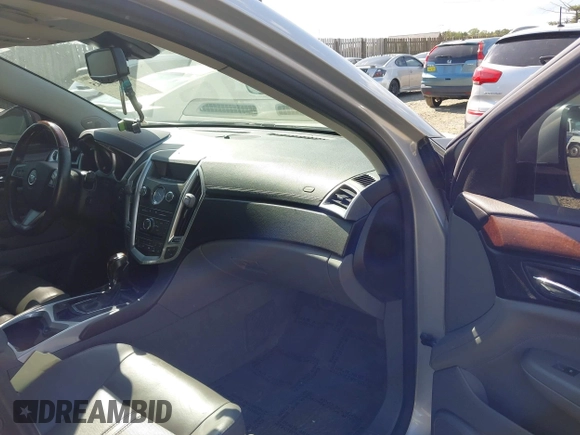✅ 2011 Cadillac SRX Luxury Collection • VIN: 3GYFNDEY8BS608971 • Lot: 43123645. Wystawiony na IAAI z przebiegiem 148 549 mil. Bezpłatny archiwum sprzedaży aukcyjnych z USA i szczegółowy raport historii pojazdu na DreamBid. Zdjęcie 5.