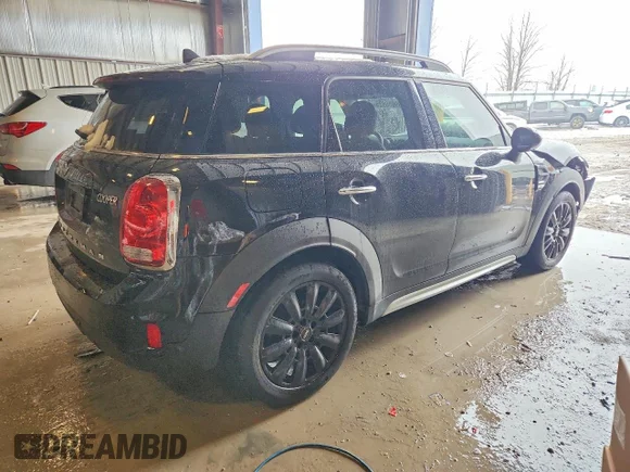 ✅ 2017 MINI Countryman Cooper • VIN: WMZYV5C37H3E01467 • Lot: 99636625. Wystawiony na Copart z przebiegiem 142 800 mil. Bezpłatny archiwum sprzedaży aukcyjnych z USA i szczegółowy raport historii pojazdu na DreamBid. Zdjęcie 6.