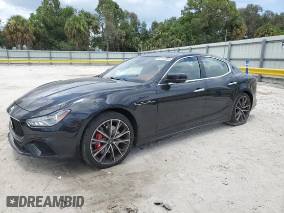 ✅ 2022 Maserati Ghibli Modena • VIN: ZAM57YSMXNX394486 • Lot: 67107455. Wystawiony na Copart z przebiegiem 37 187 mil. Bezpłatny archiwum sprzedaży aukcyjnych z USA i szczegółowy raport historii pojazdu na DreamBid. Zdjęcie 1.
