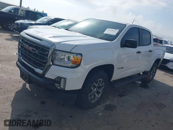 ✅ 2021 GMC Canyon 4WD AT4 • VIN: 1GTG6FENXM1106153 • Лот: 42425452. Опубликован ранее на IAAI с пробегом 56 659 миль. Бесплатный доступ к архиву аукционных продаж из США и подробный отчёт об истории автомобиля на DreamBid. Изображение 18.