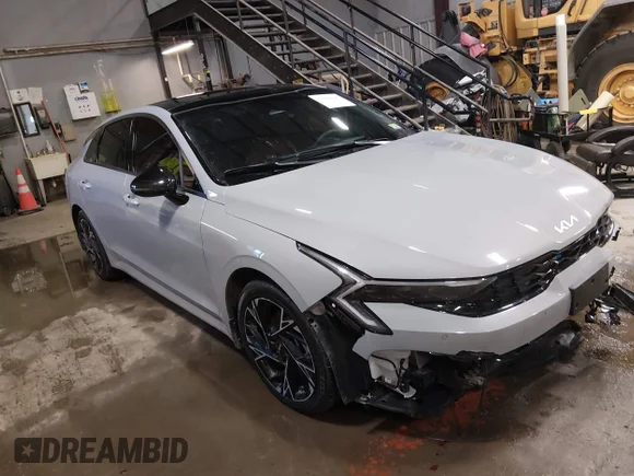 ✅ 2025 Kia K5 GT-Line • VIN: KNAG64J71S5385250 • Лот: 44392125. Опубліковано раніше на IAAI з пробігом 10 087 миль. Безкоштовний доступ до архіву аукціонних продажів зі США та докладний звіт про історію автомобіля на DreamBid. Зображення 1.
