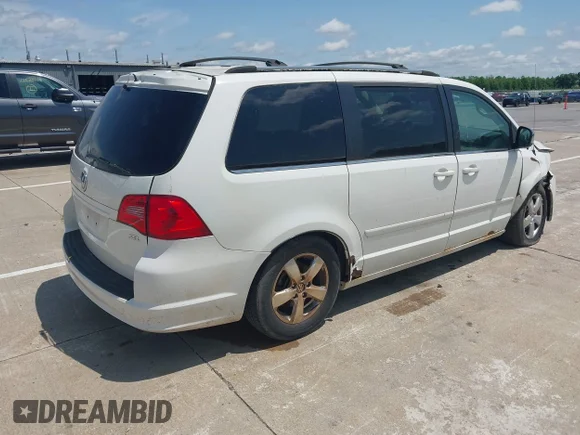 ✅ 2009 Volkswagen Routan SEL Premium • VIN: 2V8HW64X59R500433 • Лот: 42521814. Опубліковано раніше на IAAI з пробігом 133 851 миль. Безкоштовний доступ до архіву аукціонних продажів зі США та докладний звіт про історію автомобіля на DreamBid. Зображення 4.