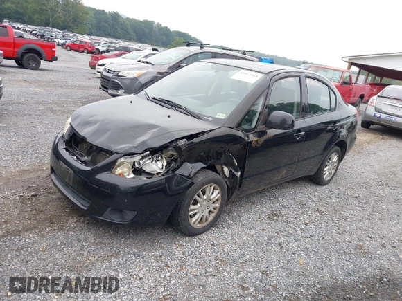 ✅ 2013 Suzuki SX4 LE • VIN: JS2YC5A37D6102761 • Лот: 42913561. Опубліковано раніше на IAAI з пробігом 192 524 миль. Безкоштовний доступ до архіву аукціонних продажів зі США та докладний звіт про історію автомобіля на DreamBid. Зображення 2.
