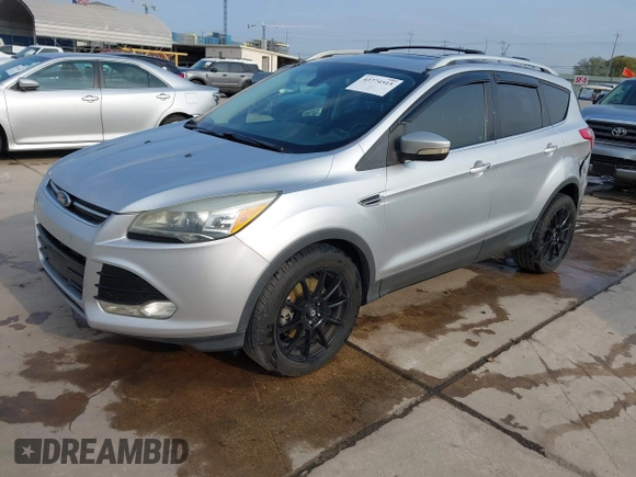 ✅ 2013 Ford Escape Titanium • VIN: 1FMCU9J95DUB00222 • Lot: 43774515. Wystawiony na IAAI z przebiegiem 192 694 mil. Bezpłatny archiwum sprzedaży aukcyjnych z USA i szczegółowy raport historii pojazdu na DreamBid. Zdjęcie 2.