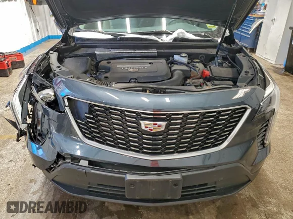 ✅ 2021 Cadillac XT4 AWD Luxury • VIN: 1GYFZBR42MF000564 • Lot: 97280895. Listed on Copart with 46,548 mi. Free auction sales archive from the USA and detailed vehicle history report at DreamBid. Image 12.