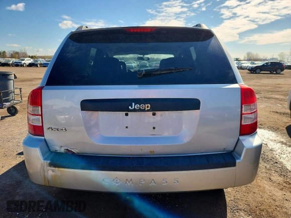 ✅ 2009 Jeep Compass Sport • VIN: 1J4FF47B69D230665 • Lot: 51178176. Listed on Copart with 305,316 mi. Free auction sales archive from the USA and detailed vehicle history report at DreamBid. Image 6.