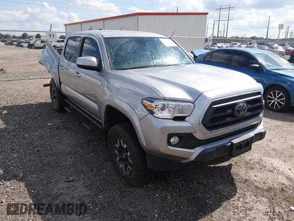 ✅ 2023 Toyota Tacoma SR5 • VIN: 3TMAZ5CN2PM208662 • Лот: 45055271. Опубликован ранее на IAAI с пробегом 50 760 миль. Бесплатный доступ к архиву аукционных продаж из США и подробный отчёт об истории автомобиля на DreamBid. Изображение 1.