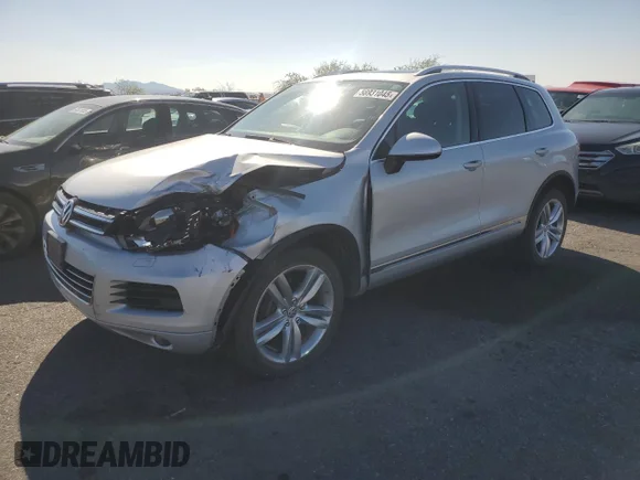 ✅ 2013 Volkswagen Touareg Lux • VIN: WVGEP9BP6DD003706 • Lot: 56931045. Wystawiony na Copart z przebiegiem 161 551 mil. Bezpłatny archiwum sprzedaży aukcyjnych z USA i szczegółowy raport historii pojazdu na DreamBid. Zdjęcie 1.