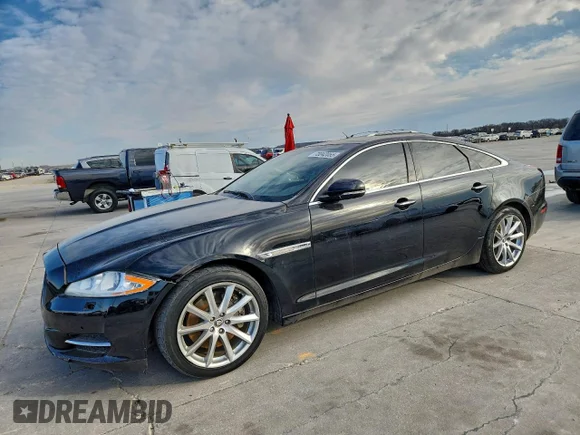✅ 2012 Jaguar XJ • VIN: SAJWA1CB9CLV33432 • Lot: 73042055. Listed on Copart with 122,084 mi. Free auction sales archive from the USA and detailed vehicle history report at DreamBid. Image 1.
