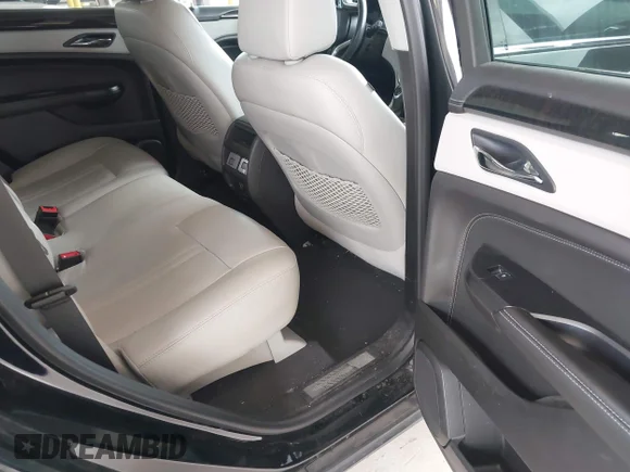 ✅ 2014 Cadillac SRX Luxury Collection • VIN: 3GYFNEE36ES677883 • Lot: 42260861. Wystawiony na IAAI z przebiegiem 51 730 mil. Bezpłatny archiwum sprzedaży aukcyjnych z USA i szczegółowy raport historii pojazdu na DreamBid. Zdjęcie 8.