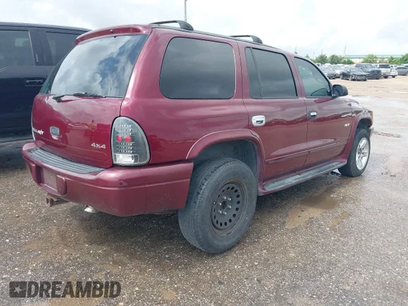 ✅ 2001 Dodge Durango • VIN: 1B4HS28Z11F533336 • Lot: 45307177. Listed on IAAI with 171,621 mi. Free auction sales archive from the USA and detailed vehicle history report at DreamBid. Image 4.