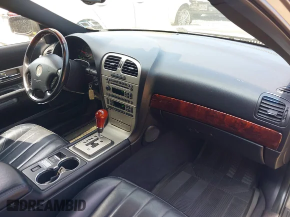✅ 2003 Lincoln LS Sport • VIN: 1LNHM87A73Y706288 • Lot: 42823497. Wystawiony na IAAI z przebiegiem 71 281 mil. Bezpłatny archiwum sprzedaży aukcyjnych z USA i szczegółowy raport historii pojazdu na DreamBid. Zdjęcie 5.