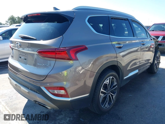 ✅ 2019 Hyundai Santa Fe Limited • VIN: 5NMS5CAA8KH036668 • Lot: 43544647. Wystawiony na IAAI z przebiegiem 82 738 mil. Bezpłatny archiwum sprzedaży aukcyjnych z USA i szczegółowy raport historii pojazdu na DreamBid. Zdjęcie 4.