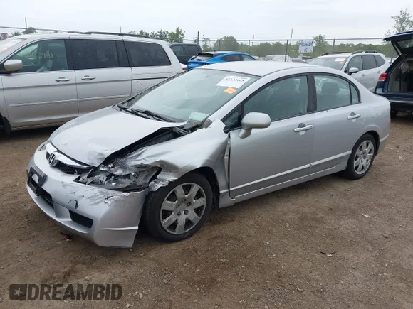 ✅ 2009 Honda Civic LX • VIN: 1HGFA16559L010309 • Lot: 45123165. Wystawiony na IAAI z przebiegiem 167 790 mil. Bezpłatny archiwum sprzedaży aukcyjnych z USA i szczegółowy raport historii pojazdu na DreamBid. Zdjęcie 2.