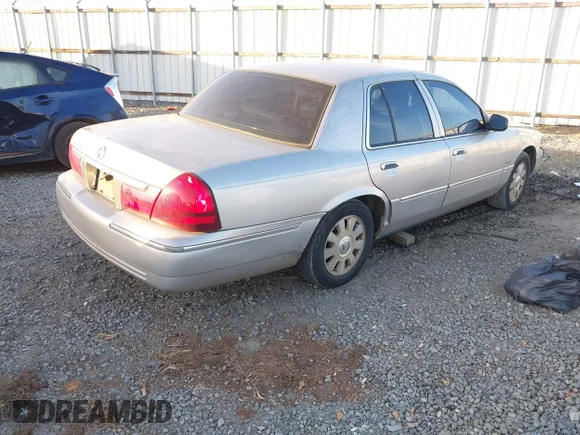 ✅ 2003 Mercury Grand Marquis LS Premium • VIN: 2MEHM75WX3X703574 • Lot: 44018279. Wystawiony na IAAI z przebiegiem 268 755 mil. Bezpłatny archiwum sprzedaży aukcyjnych z USA i szczegółowy raport historii pojazdu na DreamBid. Zdjęcie 4.