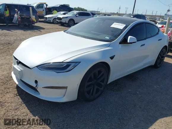 ✅ 2022 Tesla Model S • VIN: 5YJSA1E59NF470813 • Lot: 41935297. Listed on IAAI with Not provided. Free auction sales archive from the USA and detailed vehicle history report at DreamBid. Image 2.