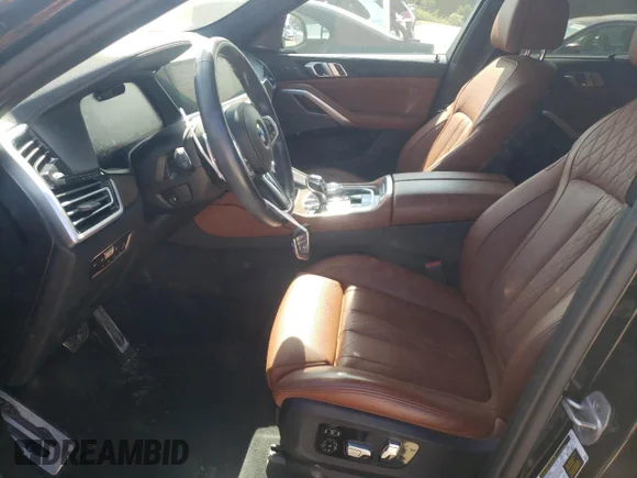 ✅ 2021 BMW X6 M50i • VIN: 5UXCY8C06M9F17046 • Лот: 76242764. Опубліковано раніше на Copart з пробігом 32 689 миль. Безкоштовний доступ до архіву аукціонних продажів зі США та докладний звіт про історію автомобіля на DreamBid. Зображення 7.
