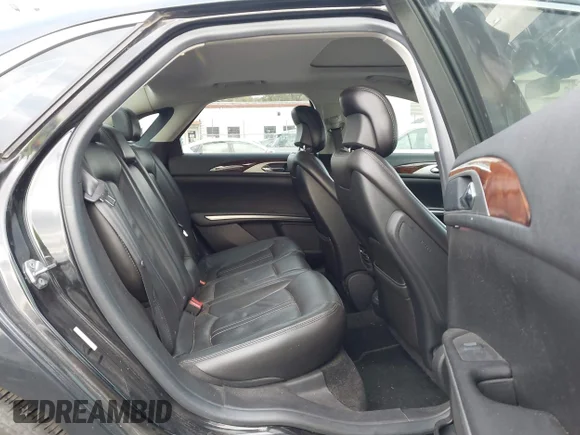 ✅ 2014 Lincoln MKZ • VIN: 3LN6L2J90ER830698 • Lot: 43606951. Wystawiony na IAAI z przebiegiem 144 496 mil. Bezpłatny archiwum sprzedaży aukcyjnych z USA i szczegółowy raport historii pojazdu na DreamBid. Zdjęcie 8.