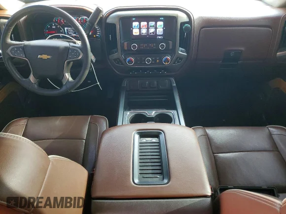 ✅ 2017 Chevrolet Silverado 1500 High Country • VIN: 3GCUKTEJ1HG130701 • Lot: 73684455. Wystawiony na Copart z przebiegiem 121 006 mil. Bezpłatny archiwum sprzedaży aukcyjnych z USA i szczegółowy raport historii pojazdu na DreamBid. Zdjęcie 8.
