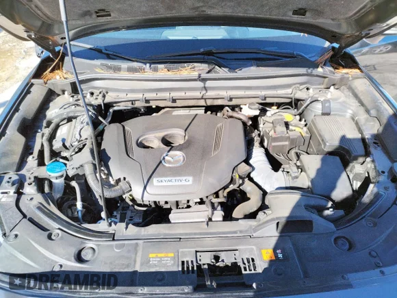 ✅ 2021 Mazda CX-5 Grand Touring Reserve • VIN: JM3KFBAY4M0336061 • Лот: 38503843. Опубліковано раніше на Copart з пробігом 24 158 миль. Безкоштовний доступ до архіву аукціонних продажів зі США та докладний звіт про історію автомобіля на DreamBid. Зображення 12.
