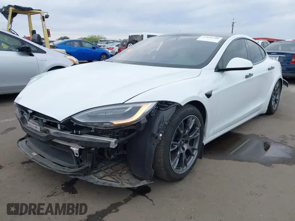 ✅ 2021 Tesla Model S Long Range • VIN: 5YJSA1E57MF453815 • Lot: 41818700. Listed on IAAI with 51,176 mi. Free auction sales archive from the USA and detailed vehicle history report at DreamBid. Image 2.