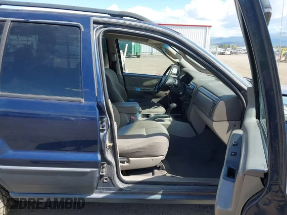 ✅ 2004 Jeep Grand Cherokee Laredo • VIN: 1J4GW48S34C267321 • Lot: 44983783. Wystawiony na IAAI z przebiegiem 196 857 mil. Bezpłatny archiwum sprzedaży aukcyjnych z USA i szczegółowy raport historii pojazdu na DreamBid. Zdjęcie 5.