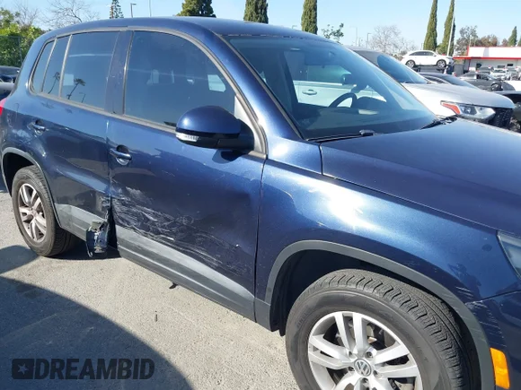 ✅ 2013 Volkswagen Tiguan S • VIN: WVGAV3AX3DW581365 • Lot: 44283574. Listed on IAAI with 127,407 mi. Free auction sales archive from the USA and detailed vehicle history report at DreamBid. Image 6.