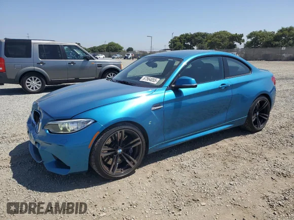 ✅ 2017 BMW M2 • VIN: WBS1H9C51HV786567 • Лот: 67564855. Опубликован ранее на Copart с пробегом 53 692 миль. Бесплатный доступ к архиву аукционных продаж из США и подробный отчёт об истории автомобиля на DreamBid. Изображение 1.