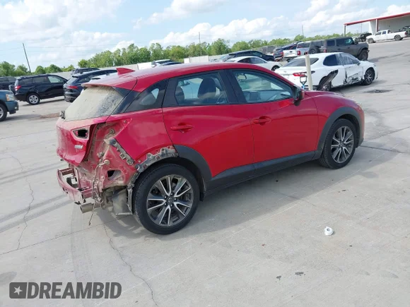 ✅ 2017 Mazda CX-3 Touring • VIN: JM1DKDC74H0174919 • Lot: 43108859. Wystawiony na IAAI z przebiegiem 124 757 mil. Bezpłatny archiwum sprzedaży aukcyjnych z USA i szczegółowy raport historii pojazdu na DreamBid. Zdjęcie 4.