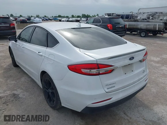 ✅ 2019 Ford Fusion SE • VIN: 3FA6P0HD2KR283197 • Lot: 45137992. Listed on IAAI with 105,533 mi. Free auction sales archive from the USA and detailed vehicle history report at DreamBid. Image 3.
