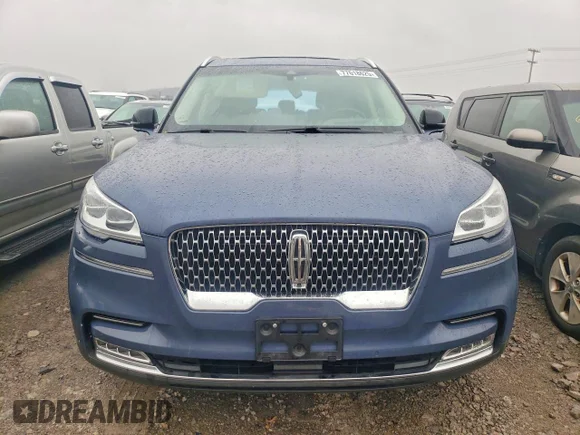 ✅ 2021 Lincoln Aviator Reserve • VIN: 5LM5J7XC7MGL13497 • Lot: 77618625. Listed on Copart with 62,867 mi. Free auction sales archive from the USA and detailed vehicle history report at DreamBid. Image 5.