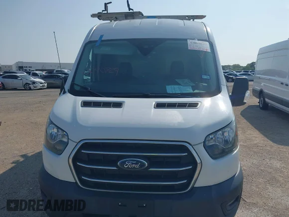 ✅ 2020 Ford Transit Cargo • VIN: 1FTBR1CG0LKA17306 • Lot: 43090829. Wystawiony na IAAI z przebiegiem 118 832 mil. Bezpłatny archiwum sprzedaży aukcyjnych z USA i szczegółowy raport historii pojazdu na DreamBid. Zdjęcie 6.