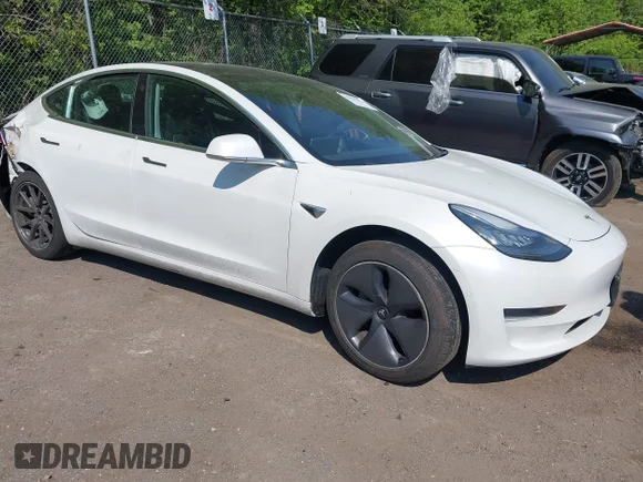 ✅ 2020 Tesla Model 3 Standard Range Plus • VIN: 5YJ3E1EA4LF598007 • Lot: 44951983. Listed on IAAI with 56,781 mi. Free auction sales archive from the USA and detailed vehicle history report at DreamBid. Image 1.
