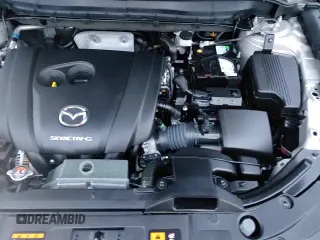 ✅ 2025 Mazda CX-5 S Preferred • VIN: JM3KFBCL7S0616779 • Лот: 92164005. Опубликован ранее на Copart с пробегом 13 582 миль. Бесплатный доступ к архиву аукционных продаж из США и подробный отчёт об истории автомобиля на DreamBid. Изображение 14.