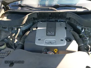 ✅ 2015 Infiniti QX70 • VIN: JN8CS1MW6FM482894 • Lot: 41671236. Listed on IAAI with 106,599 mi. Free auction sales archive from the USA and detailed vehicle history report at DreamBid. Image 12.