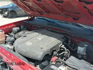 ✅ 2014 Toyota Tacoma • VIN: 3TMLU4EN1EM164374 • Lot: 42713470. Listed on IAAI with 117,653 mi. Free auction sales archive from the USA and detailed vehicle history report at DreamBid. Image 19.